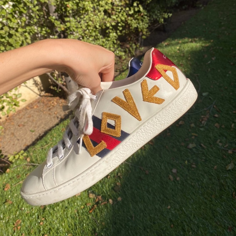 Gucci women’s Ace embroidered “love” sneaker
